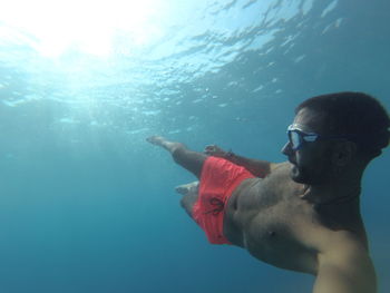 Man swimming in sea