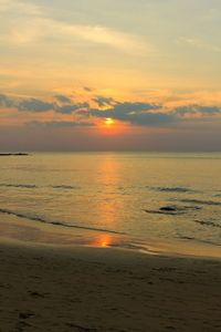 Scenic view of sea at sunset