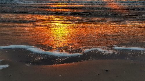 Scenic view of beach during sunset