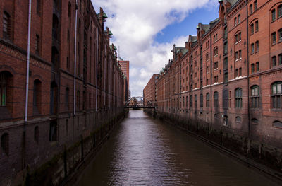 View of canal along buildings