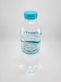 Close-up of water bottle against white background