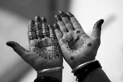 Close-up of hand applied mehandi