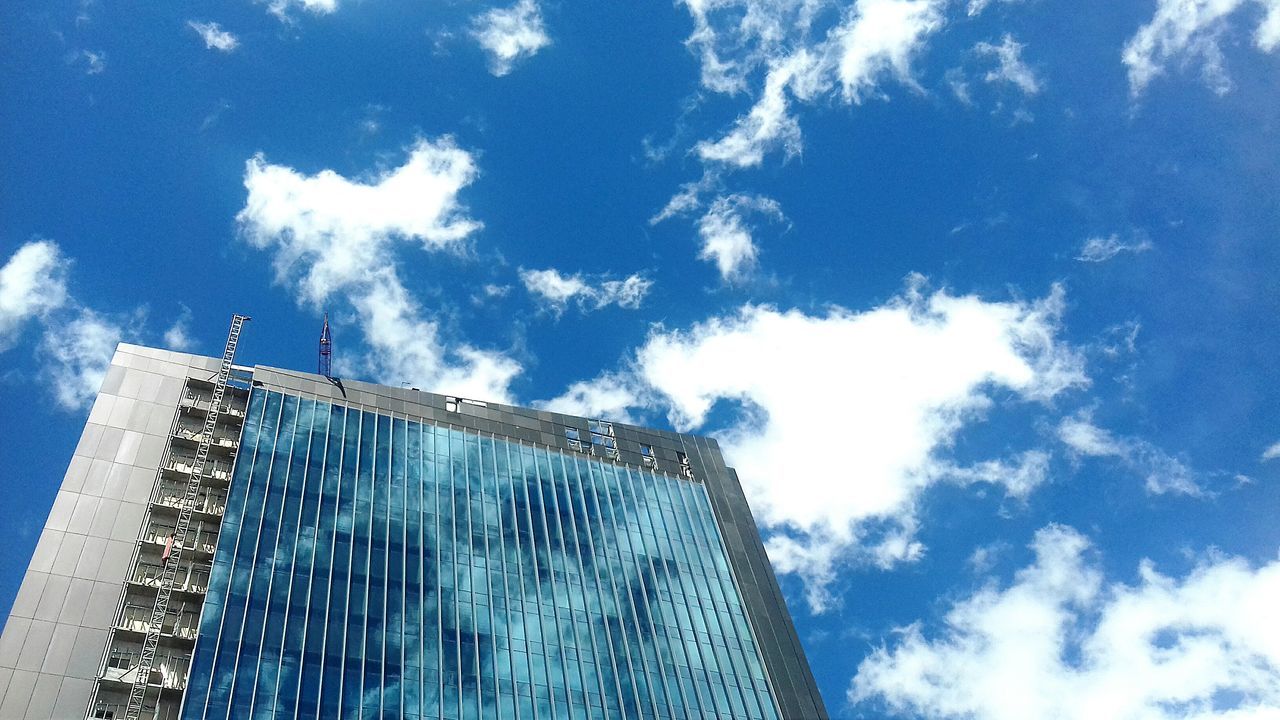 LOW ANGLE VIEW OF BUILT STRUCTURE IN WATER