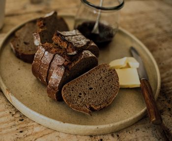 Slice whole-grain bread with butter