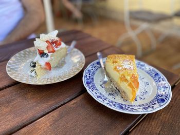 Close-up of cake served on table