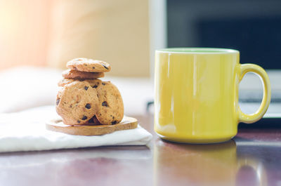 Close-up of coffee cup on table