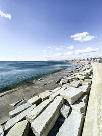 Panoramic view of beach against sky