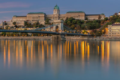 Sunrise in budapest, chain bridge with the palace palace in the background.