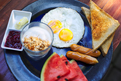 High angle view of breakfast served on table