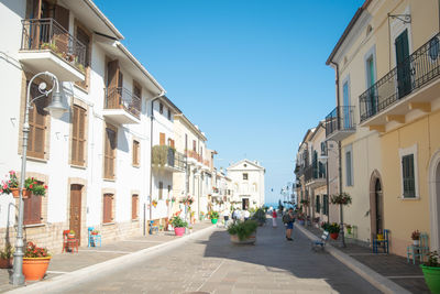 Street amidst buildings in city