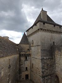 Low angle view of historical building against sky