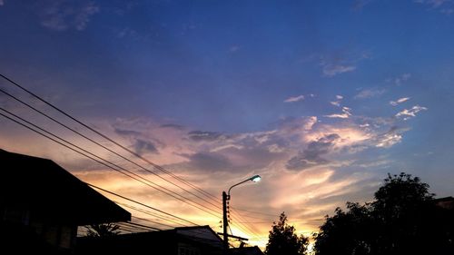 Low angle view of dramatic sky at sunset