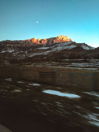 Scenic view of land against clear sky