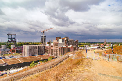 Buildings in city against sky