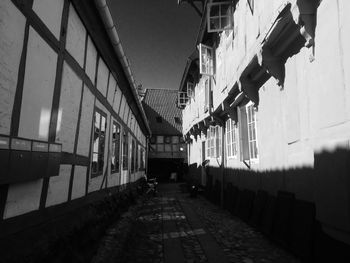 Narrow alley along buildings