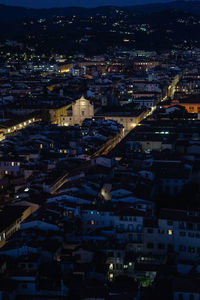 High angle view of illuminated cityscape at night