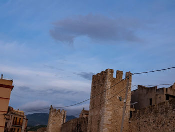 Low angle view of buildings against sky