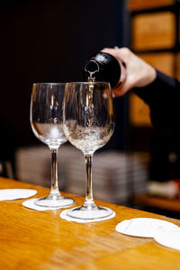 Close-up of wineglass on table