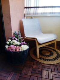 Close-up of flowers on chair