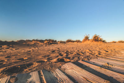 Scenic view of land against clear sky