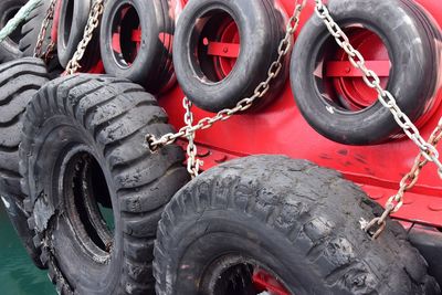 Tires hanging on boat