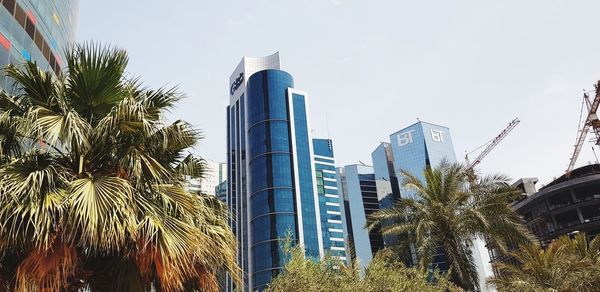 Low angle view of modern buildings against sky