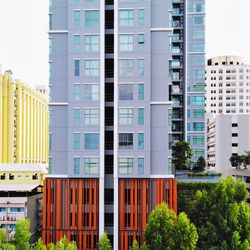 Exterior of modern buildings against clear sky