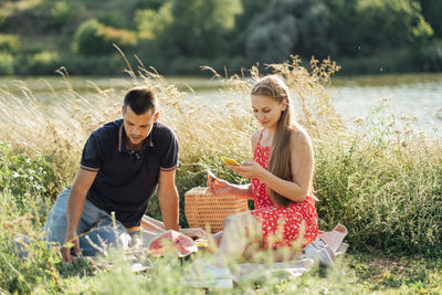 Social media internet addiction, phubbing. young couple reading social media on their smart phones