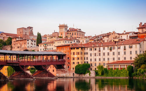 River by city against clear sky