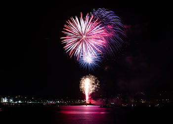 Firework display at night