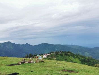 Scenic view of field against sky