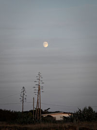 Scenic view of moon against sky at dusk