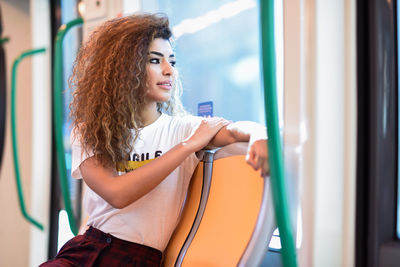 Young woman traveling in train