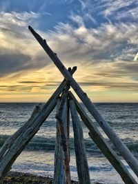 Scenic view of sea against sky at sunset