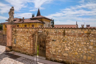 Exterior of old building against sky