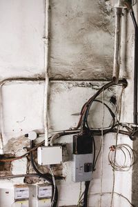 Close-up of electric lamp on wall