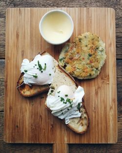 Directly above shot of served food on wooden table