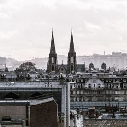 View of buildings against sky in city