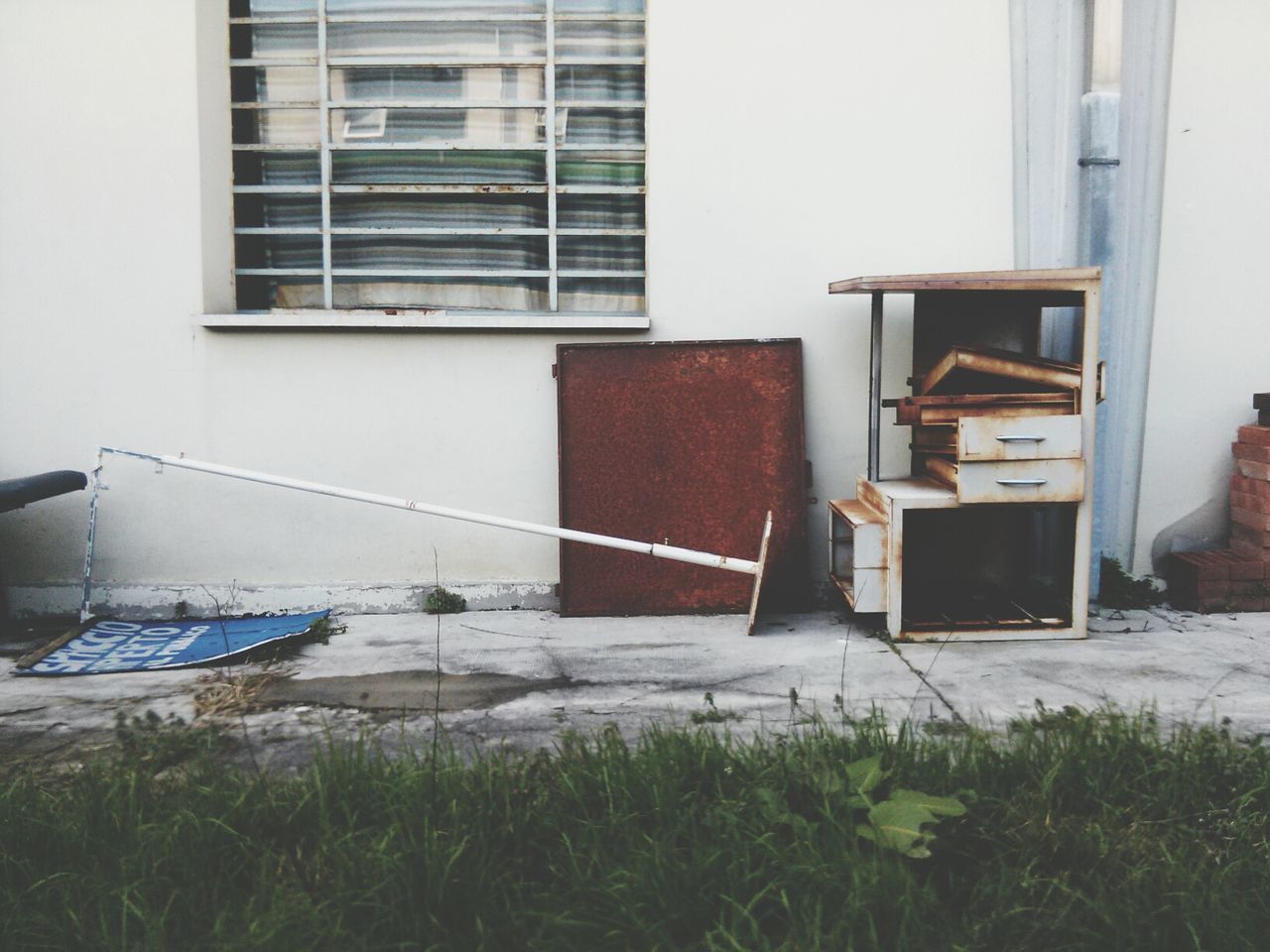 building exterior, architecture, built structure, window, residential structure, house, building, residential building, city, day, grass, outdoors, plant, no people, exterior, balcony, door, sunlight, abandoned, facade