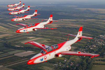 High angle view of airplane flying in sky