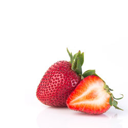 Close-up of strawberry against white background