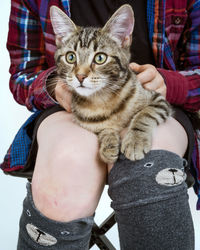 Portrait of woman with cat