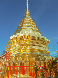 Low angle view of temple against building