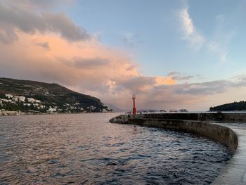 Scenic view of sea against sky at sunset