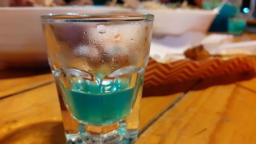 Close-up of beer glass on table