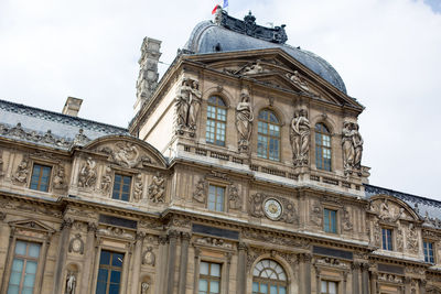 Low angle view of historical building against sky