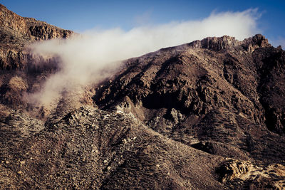 Scenic view of mountain range against sky