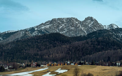Scenic view of snowcapped mountains against sky. giewont mountain. tatra mountains