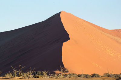 Scenic view of desert against clear sky