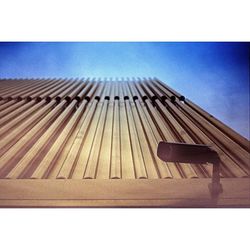 Low angle view of built structure against blue sky